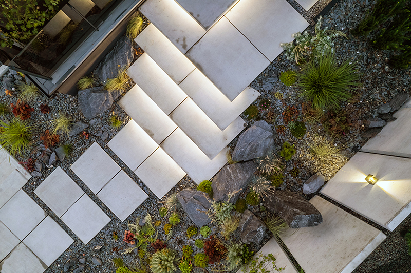 Modern Decorative Backyard Rockery Garden Stairs Illuminated by Garden LED Lighting.