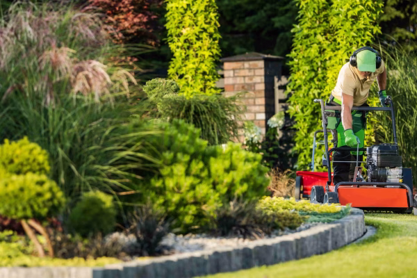 man-working-in-a-beautifully-landscaped-yard-2026-03-24-01-25-13-utc